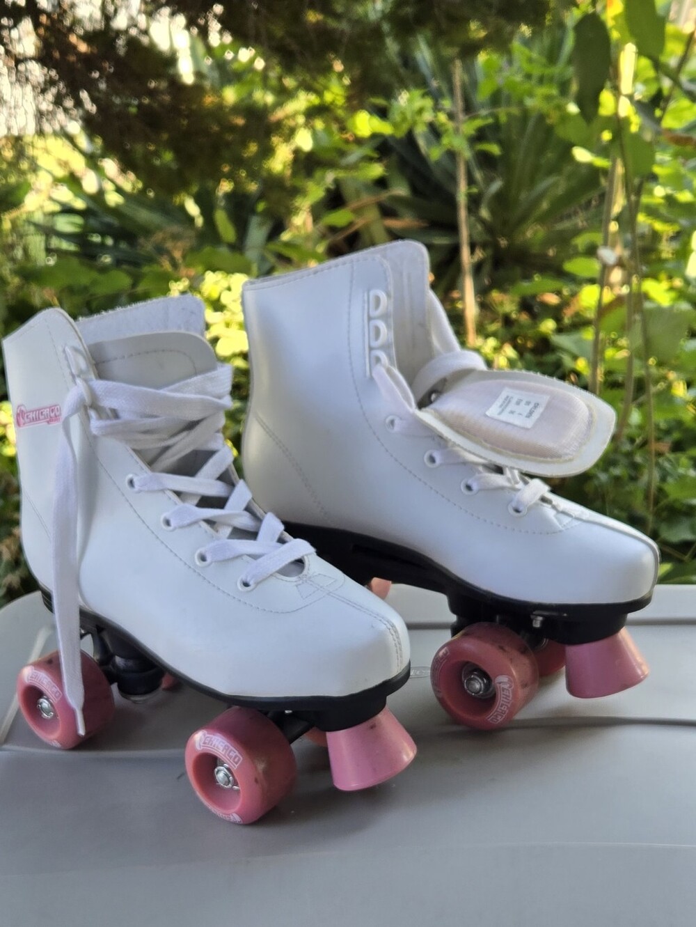 White Kids Quad Roller Skates with Pink Wheels - Youth Lace-Up